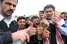 220px-Iraqi_voters_inked_fingers.jpg